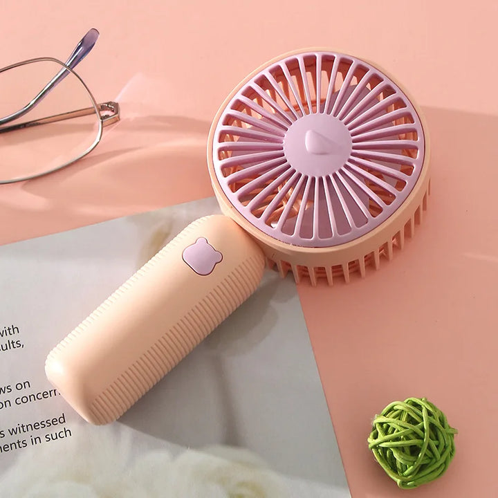 Przenośny mini wentylator USB, idealny do biura i podróży, zapewnia orzeźwiającą bryzę w upalne lato.