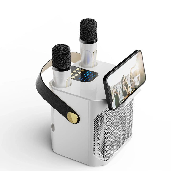 Przenośny system karaoke z dźwiękiem 360°, dwoma mikrofonami bezprzewodowymi i Bluetooth. Idealny na imprezy.
