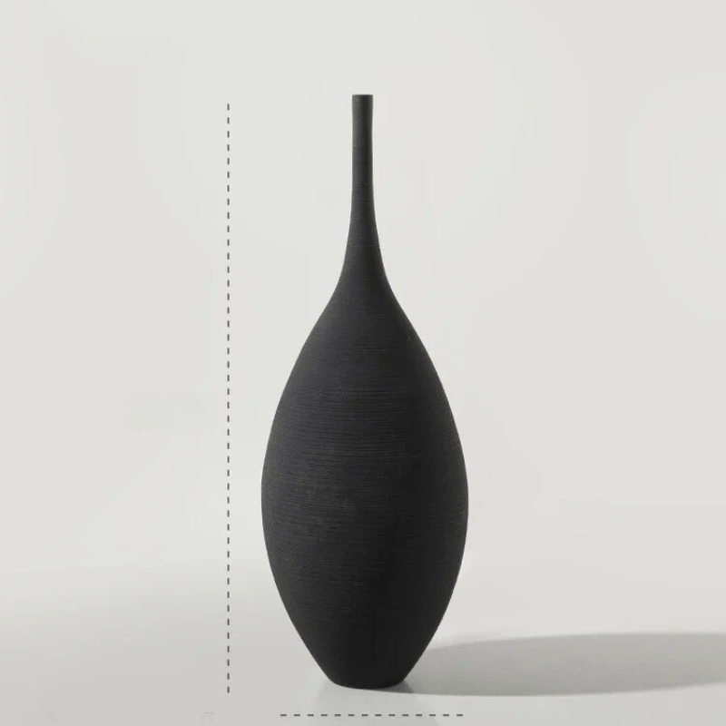 Ceramiczny wazon w bieli, ręcznie wykonany, piękna i trwała dekoracja, uzupełnienie minimalistycznego wnętrza.