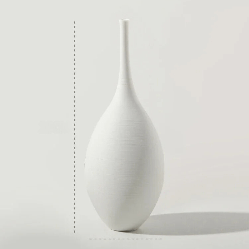 Sztuka rękodzieła – biały ceramiczny wazon, nowoczesny i elegancki, idealna dekoracja domu.