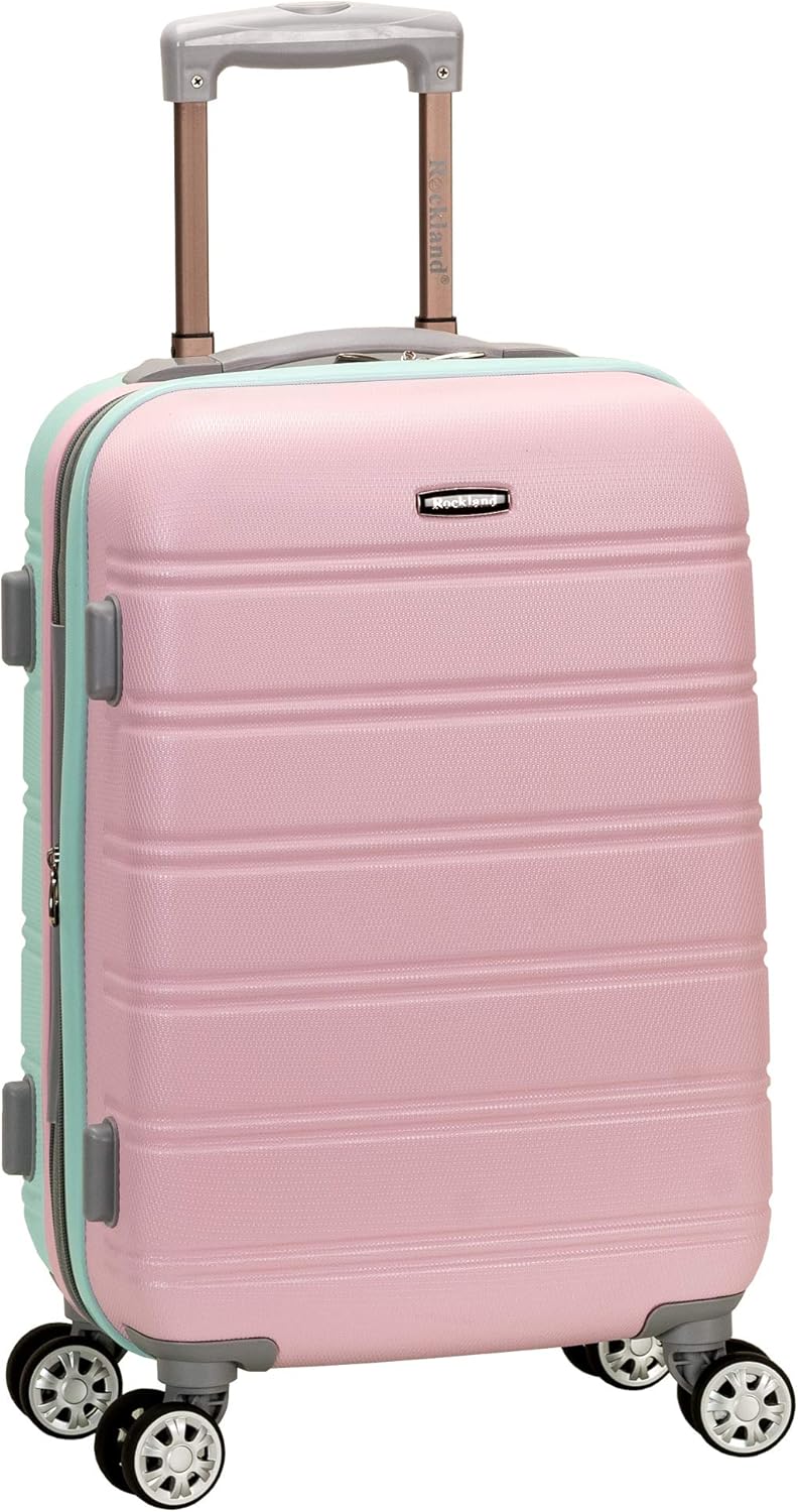 Różowa lekka walizka kabinowa "Cotton Candy" z podwójnymi kółkami obrotowymi. Idealny rozszerzalny bagaż podręczny.