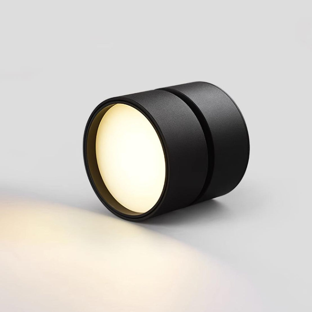 Nowoczesna lampa sufitowa LED z regulacją kierunku światła, minimalistyczny design, biała/czarna.