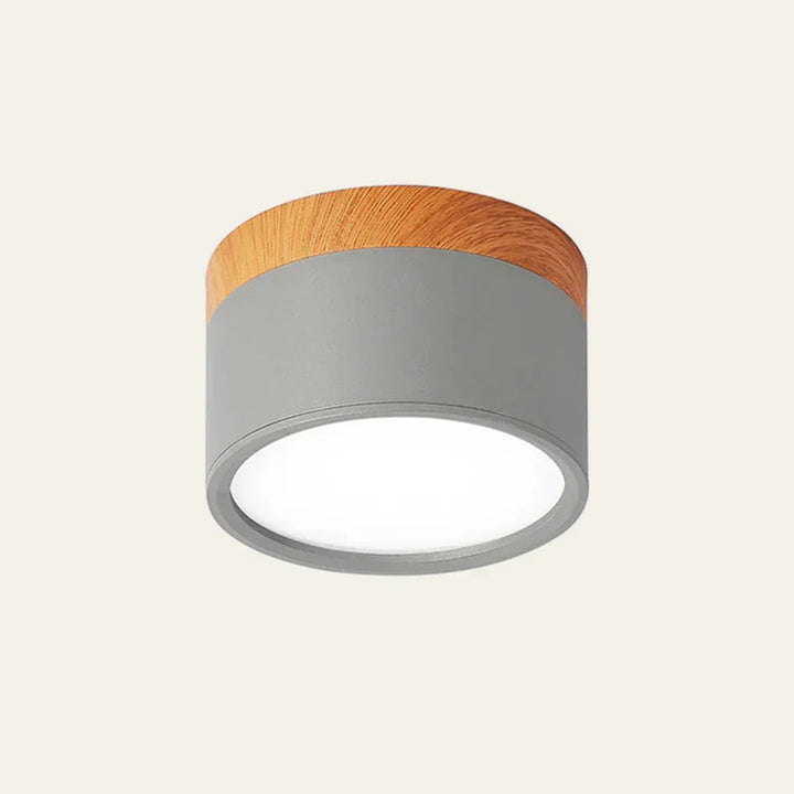 Biała lampa LED natynkowa, smukła, do korytarza. Oświetlenie akcentowe w stylu skandynawskim.