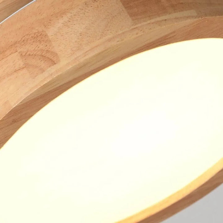 Energooszczędna lampa sufitowa LED do salonu lub sypialni. Skandynawski design z drewnianymi detalami.