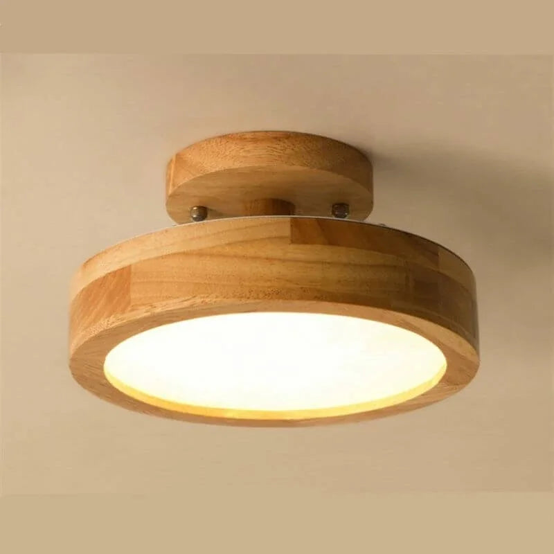 Nowoczesna lampa sufitowa LED z drewnianym elementem. Idealna do minimalistycznych wnętrz w skandynawskim stylu.