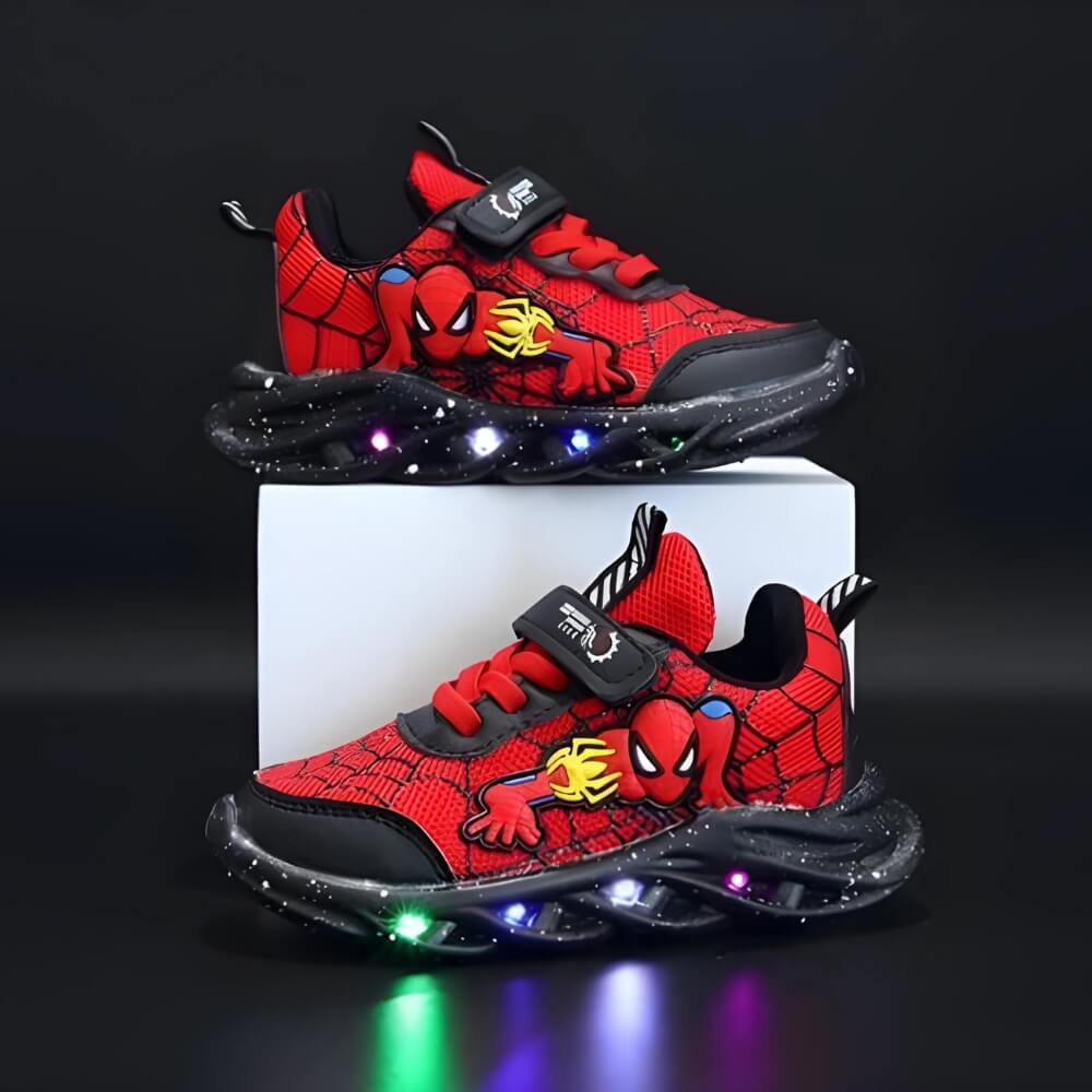 Czerwone sneakersy dziecięce z podeszwą LED prezentowane na białym podwyższeniu
