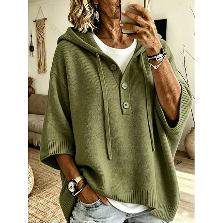 Beżowy sweter damski oversize z kapturem, widok z tyłu