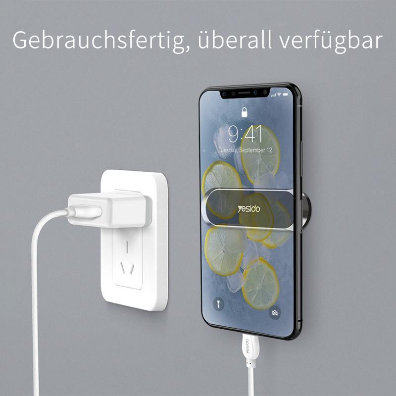 Magnetyczny uchwyt na telefon do samochodu, stabilny montaż bez śladów na desce rozdzielczej.