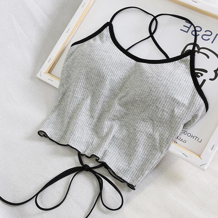Modny damski top z wiązaniem na ramiączkach, idealny na lato. Wygodny i stylowy letni tank top.