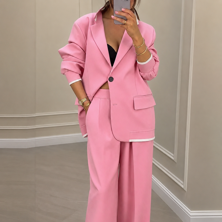 Stylizacja z elegancką marynarką i spodniami w nowoczesnym biurowym stylu