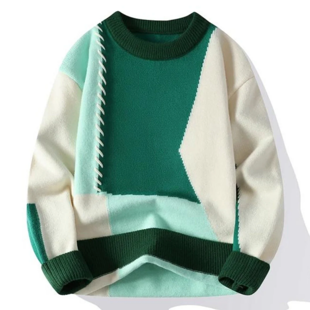 Stylowy sweter damski z wełny, unikalny wzór patchwork, zapewnia ciepło i elegancję.
