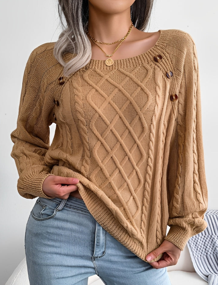 Stylowy sweter damski z guzikami, zapewniający komfort i modny wygląd na co dzień. Wygodna odzież.