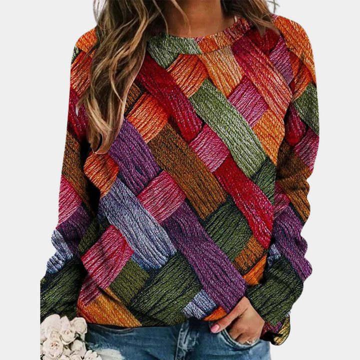 Sweter damski zimowy z kolorowym nadrukiem, idealny na co dzień i na każdą stylizację.