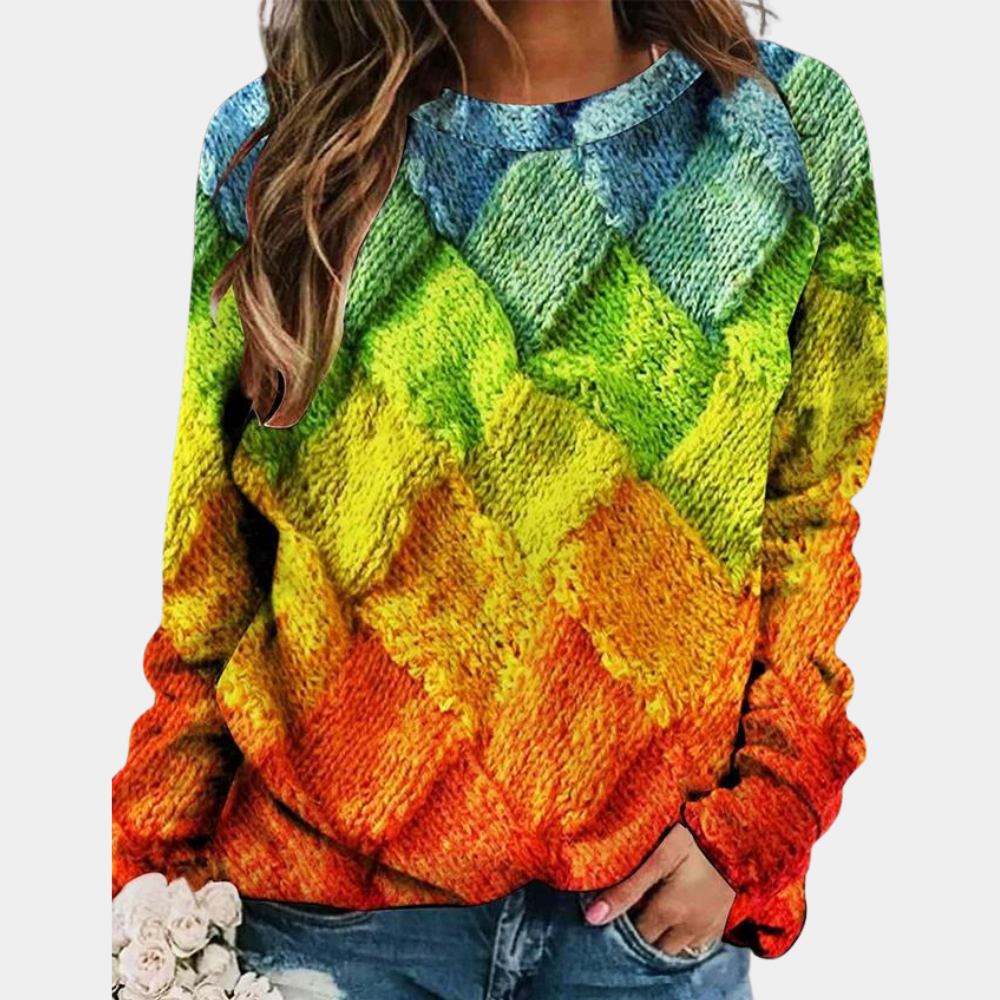 Modny sweter damski zimowy z unikalnym, barwnym nadrukiem, urozmaicający stylizację.