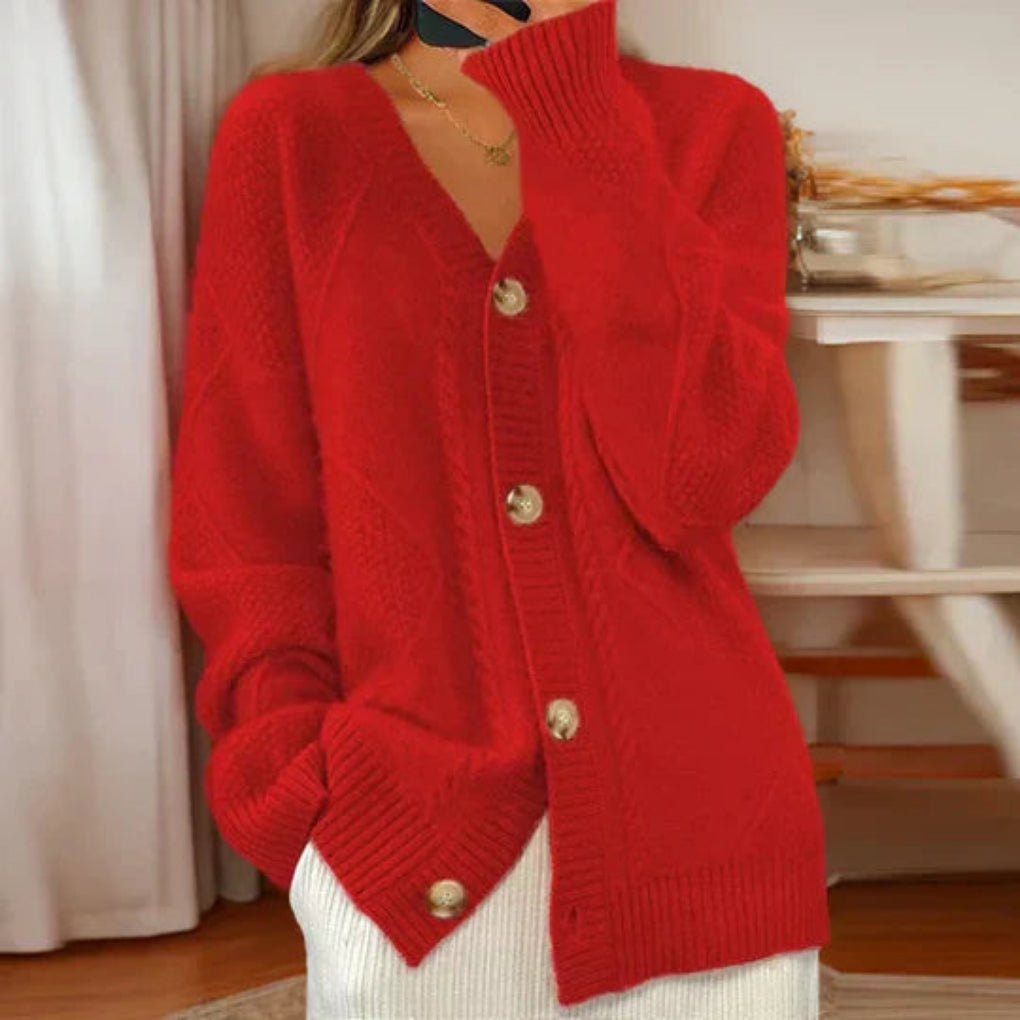 Czerwony damski sweter rozpinany oversize prezentujący elegancki splot i guziki