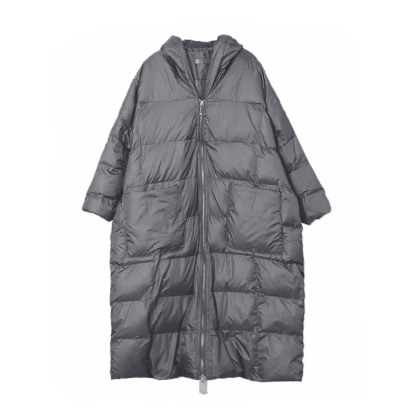 Szara damska kurtka zimowa oversize z kapturem, długa i ciepła, idealna na mroźne dni, styl streetwear.