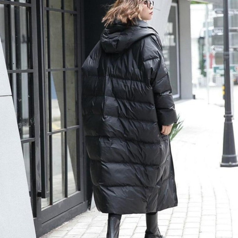 Długa damska kurtka zimowa oversize z kapturem, w kolorze szarym lub czarnym, idealna na miejski streetwear.