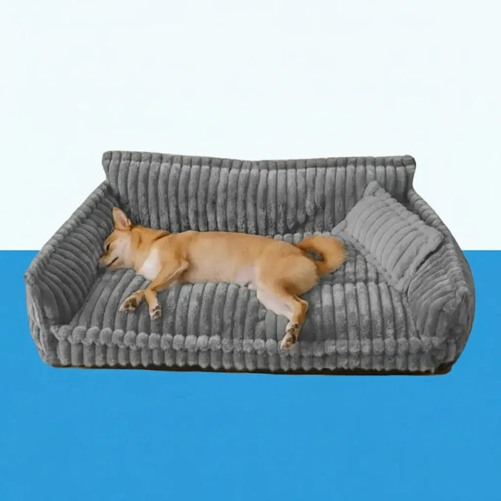 Nowoczesne szare legowisko-sofa dla psa, z ergonomicznym podparciem i możliwością prania dla wygody domu.