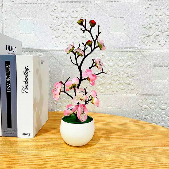 Realistyczne sztuczne bonsai drzewko, idealne jako dekoracja stołu lub półki w domu.