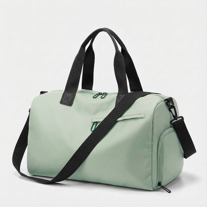 Torba sportowa duffel TrailGrip. Widoczne boczne kieszenie, w tym na buty. Idealna torba weekendowa unisex.
