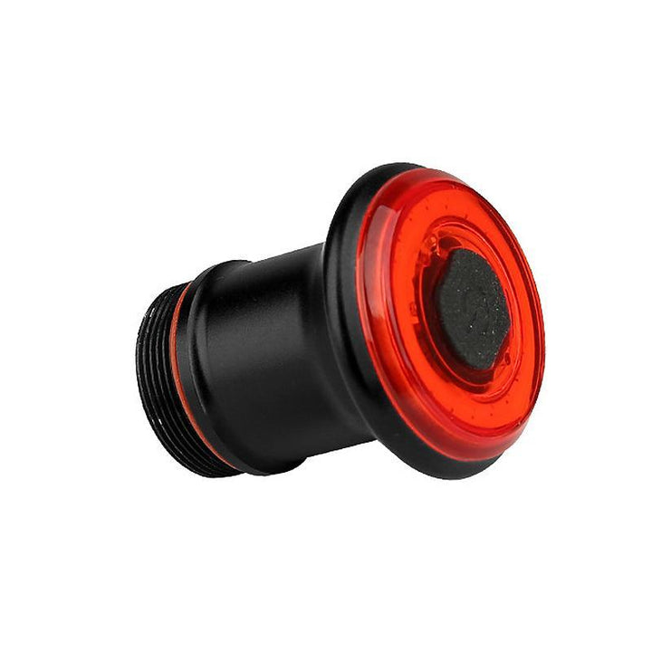 Bezpieczna tylna lampa rowerowa LED z czujnikiem hamowania, poprawia widoczność i bezpieczeństwo podczas jazdy nocą.