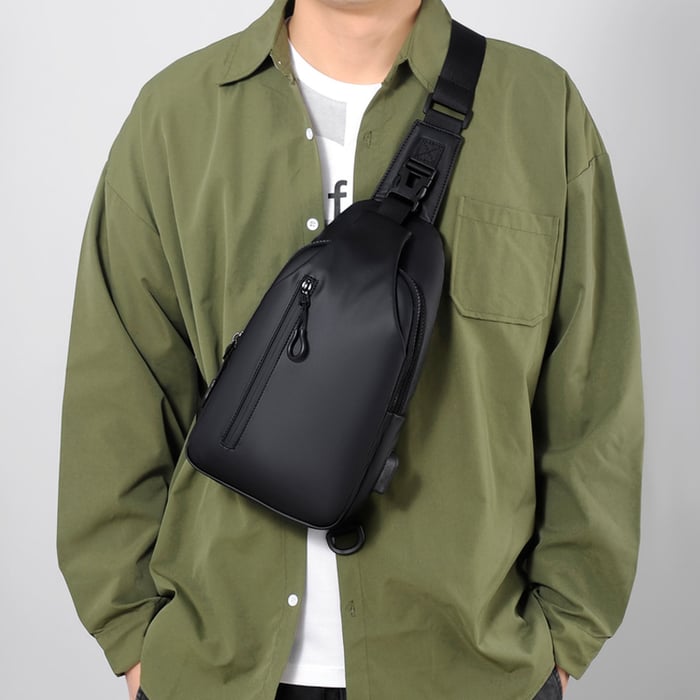 Torba unisex crossbody z wytrzymałego materiału, minimalistyczna, perfekcyjna do codziennego użytku.