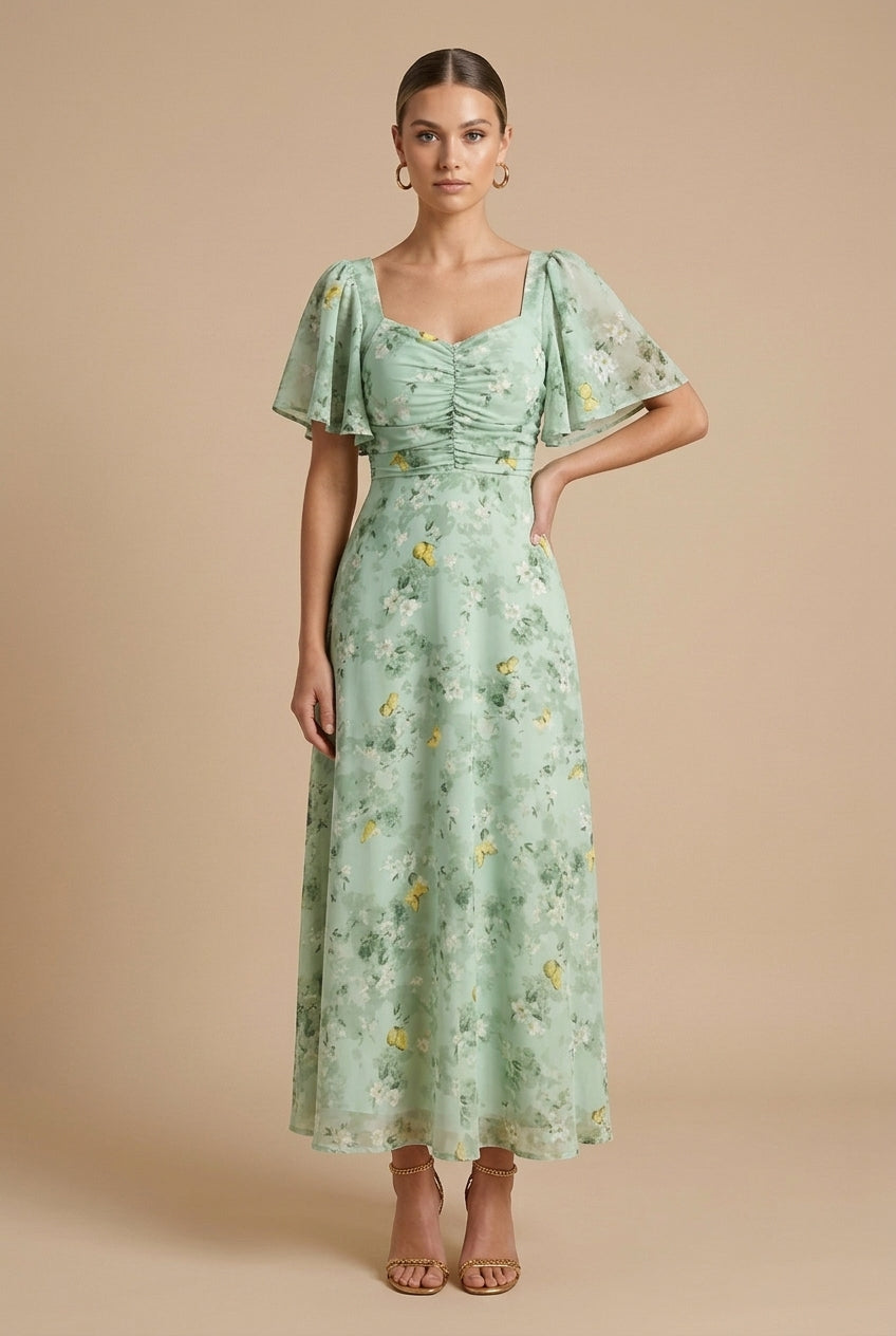 Elegancka sukienka maxi w kwiaty, zbliżenie na kwadratowy dekolt