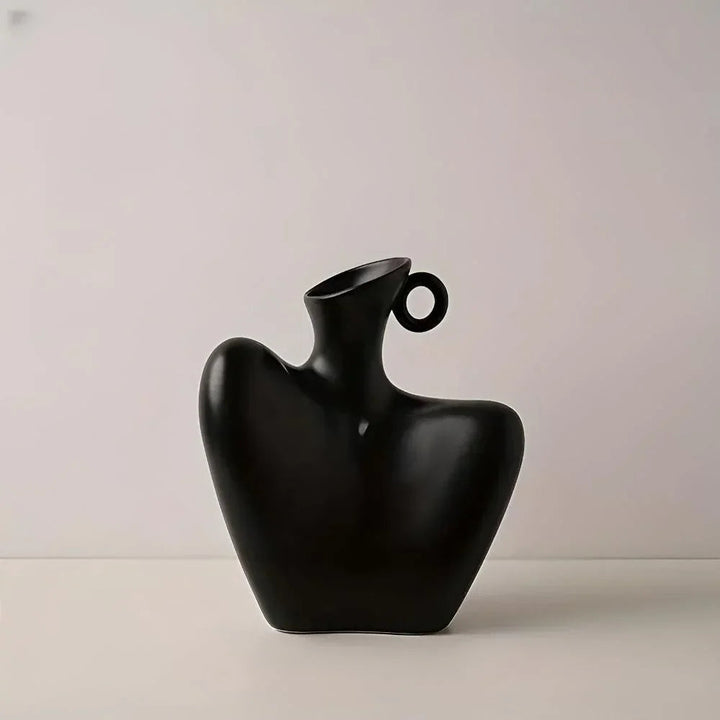Elegancki wazon dekoracyjny, artystyczny akcent do sypialni. Podkreśla nowoczesny design.