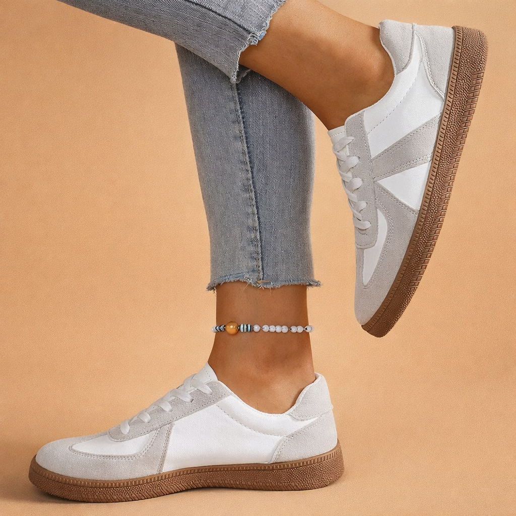 Lekkie damskie buty do chodzenia z wygodnym wsparciem. Białe sneakersy patchwork, idealne na wiosnę.