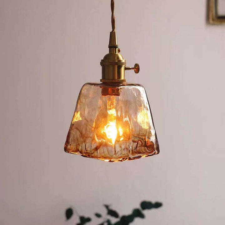 Designerska lampa wisząca LED do sypialni. Nowoczesne retro z ciepłym, przyjemnym światłem.