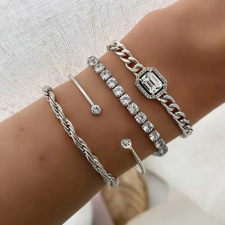 Elegancki zestaw złotych bransoletek damskich. Nowoczesna złota biżuteria, idealny dodatek na każdą okazję.