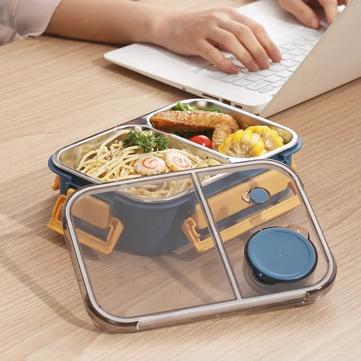 Niebieski lunchbox bento izolowany z przegródkami, łatwy do czyszczenia, idealny na piknik.